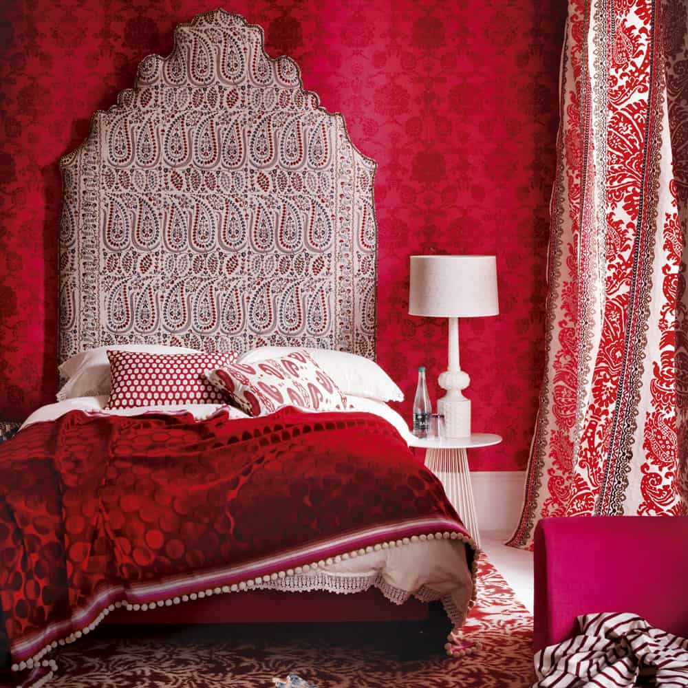 dramatic red bedroom with patterns