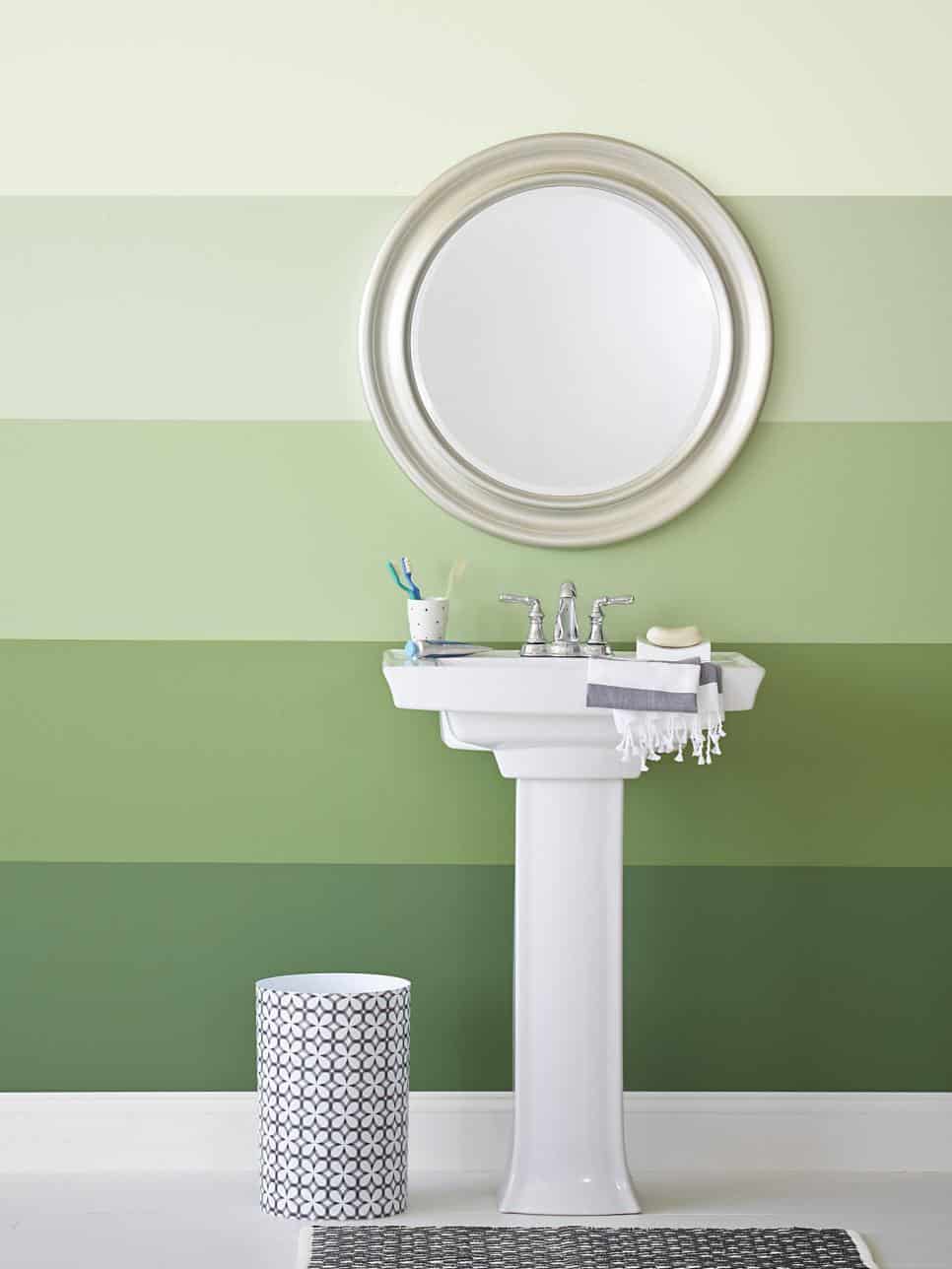 Go bold or go home is the perfect way of describing using green bold stripes in your bathroom.