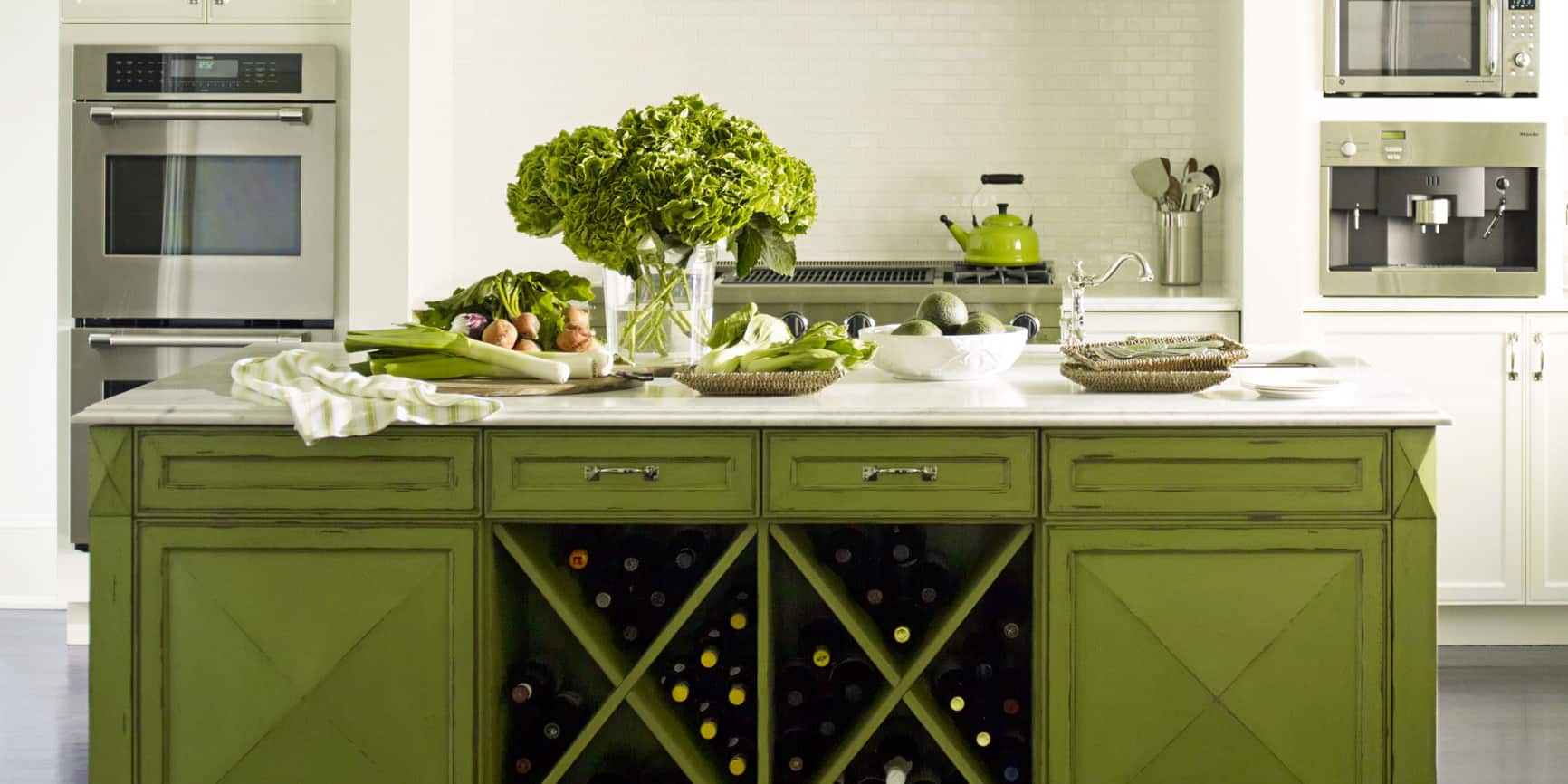 Although we love mossy green for a dining room it also works in your kitchen as a pop of color