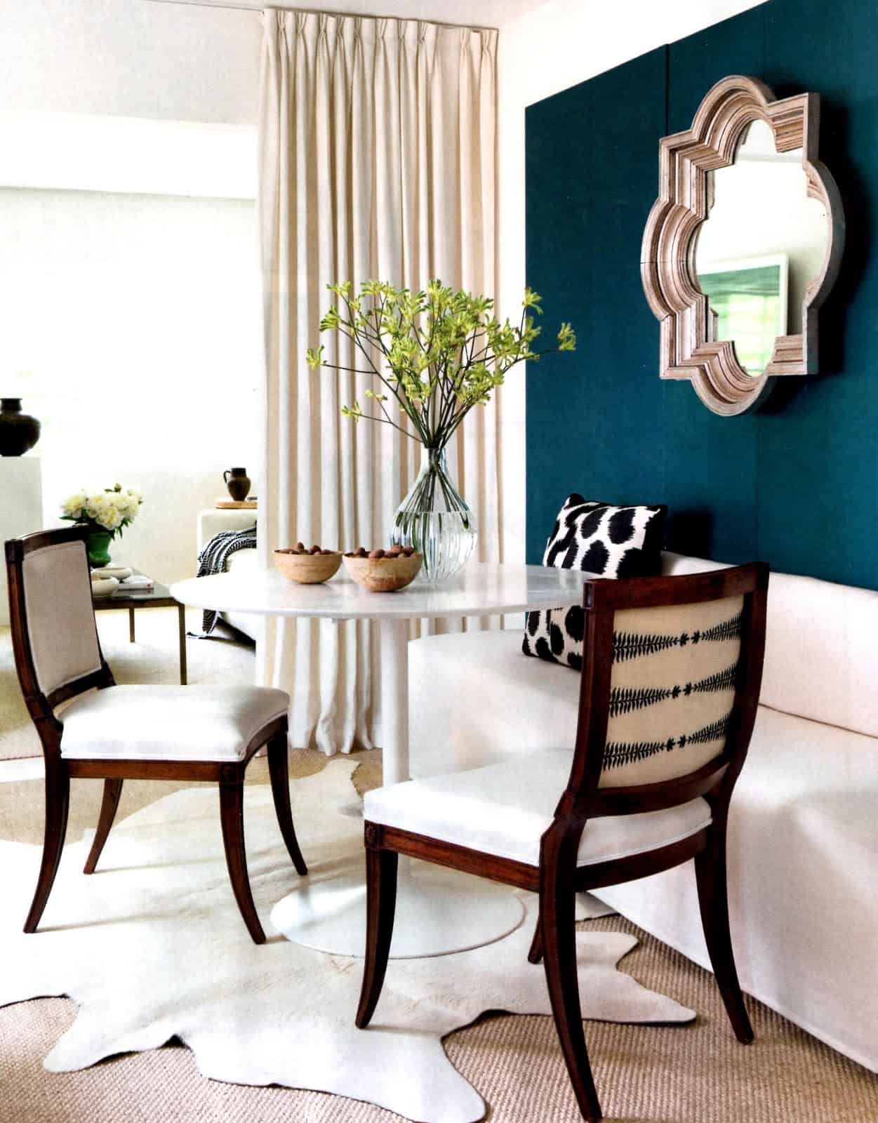 Using darker hues works well to elevate the space and give it an elegant fell.