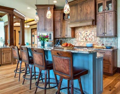 Blue is a beautiful color to add into a rustic kitchen because it just flows well.