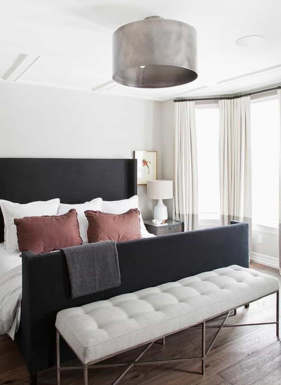 Multiple different light fixtures in one bedroom give the room a romantic twist while providing ample amounts of lighting.