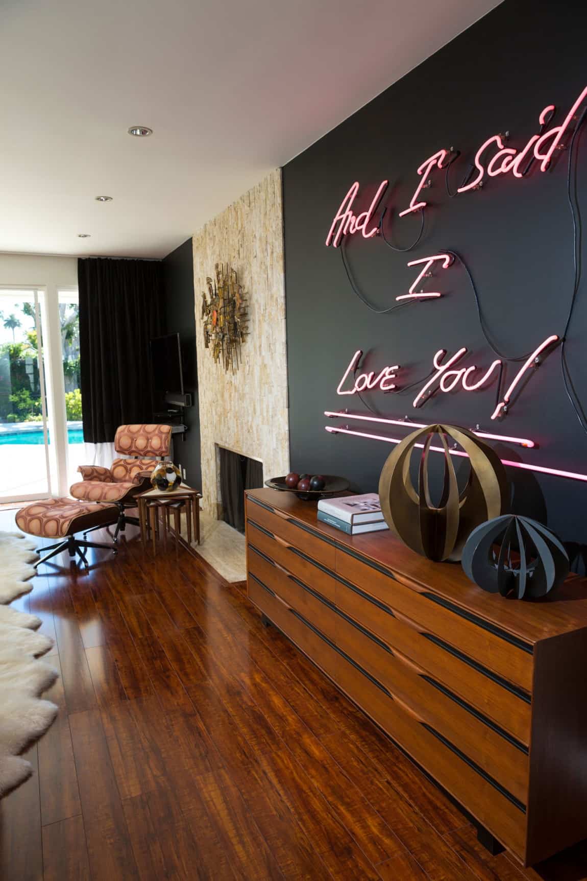 pop of color on black wall  Trendy Ways To Decorate With Neon Signs