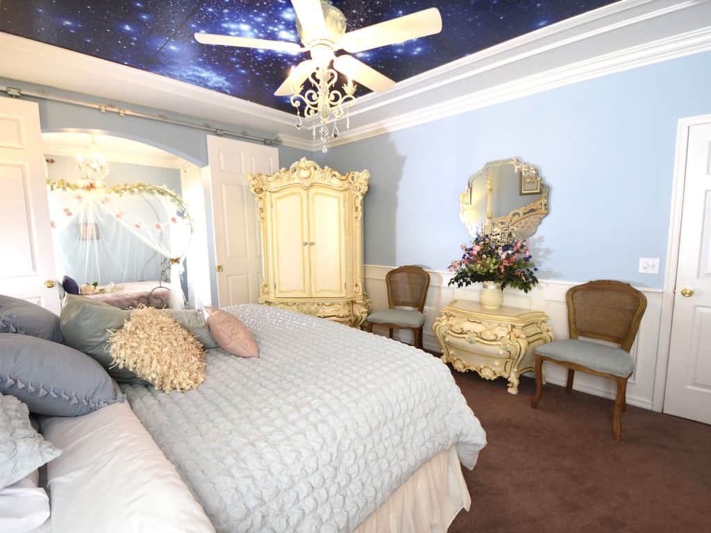 master bedroom with chandelier