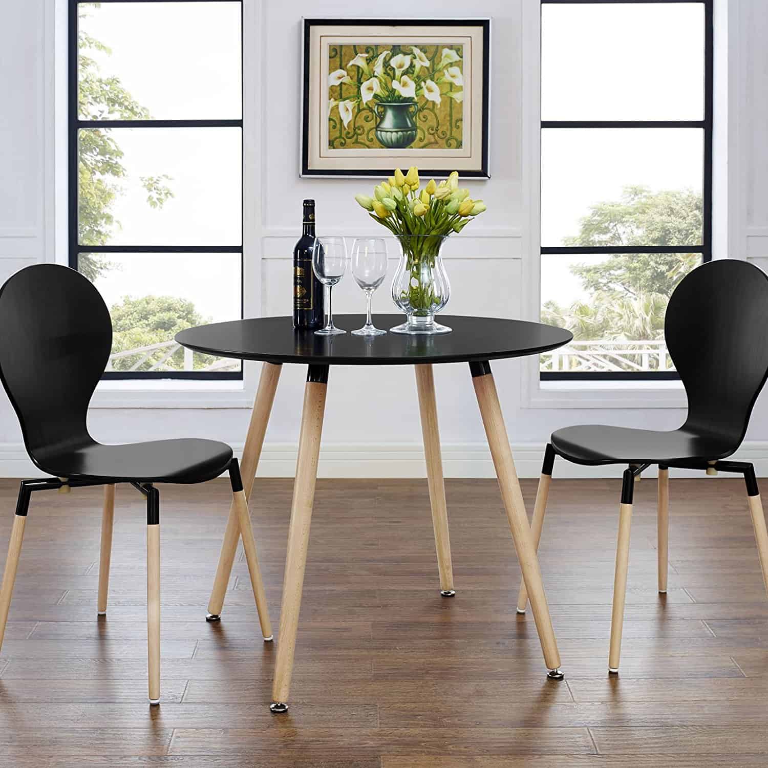two chairs Slick Ways To Make The Most Out Of A Small Dining Room