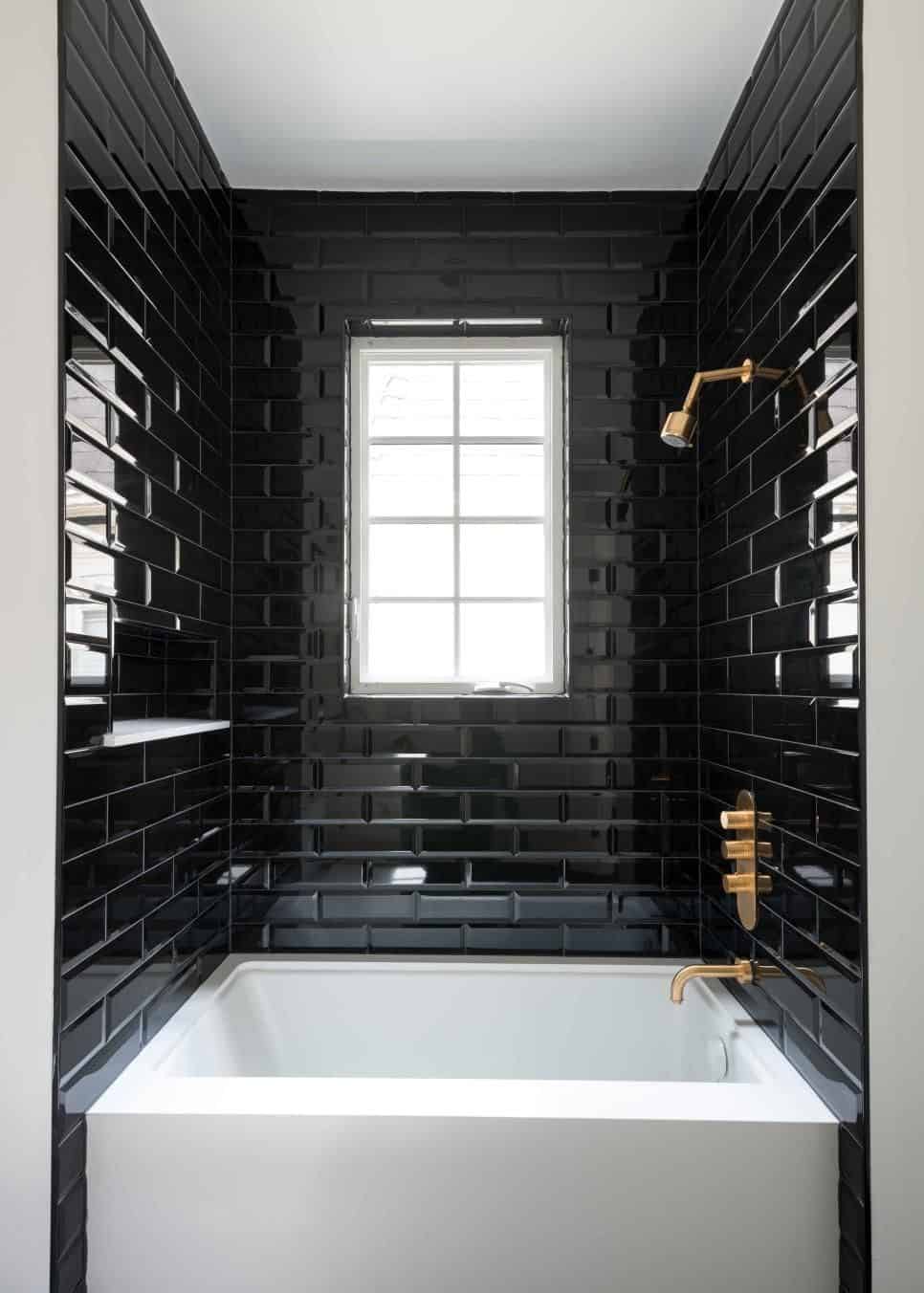black tiles in the tub