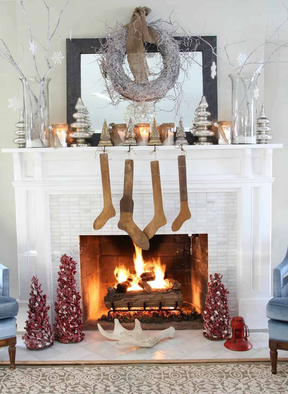 candlw qirh nusw Christmas Mantel Decorations That Give Santa A Cozy Welcoming