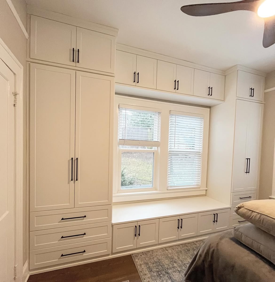 04-full-wall-white-cabinet-build-around-a-bedroom-window