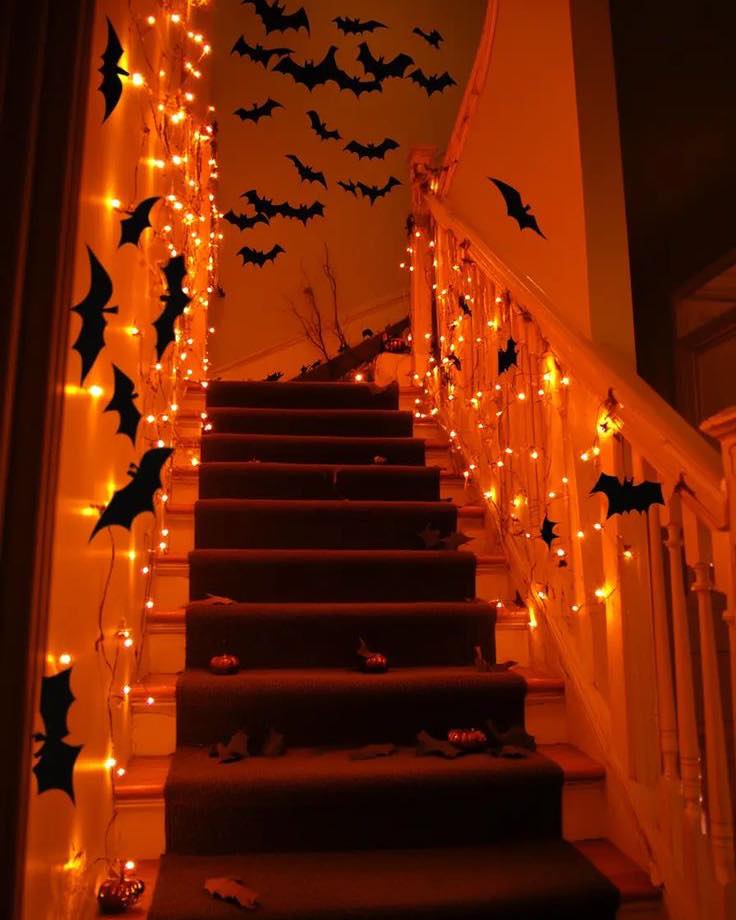 04-warm-orange-lights-paper-bats-simple-staircase-juniorsartanddiy