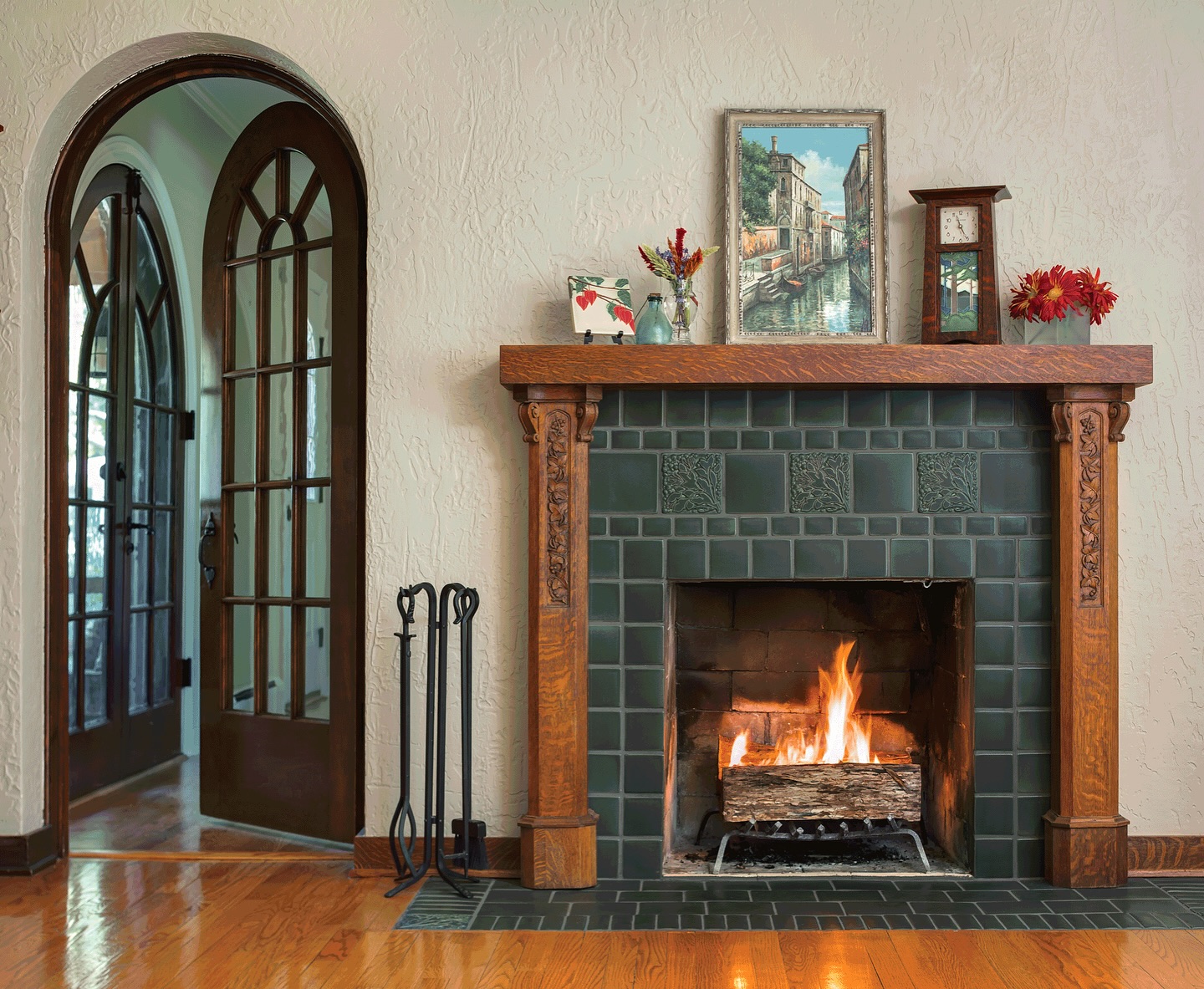 05-fireplace-tile-ideas-craftsman-green-tile-floral-accents