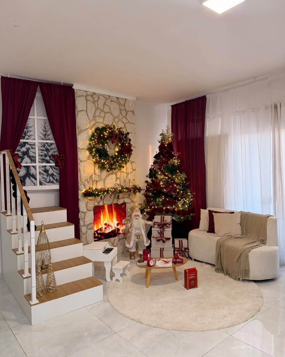 09-burgundy-curtains-stone-fireplace-christmas-tree