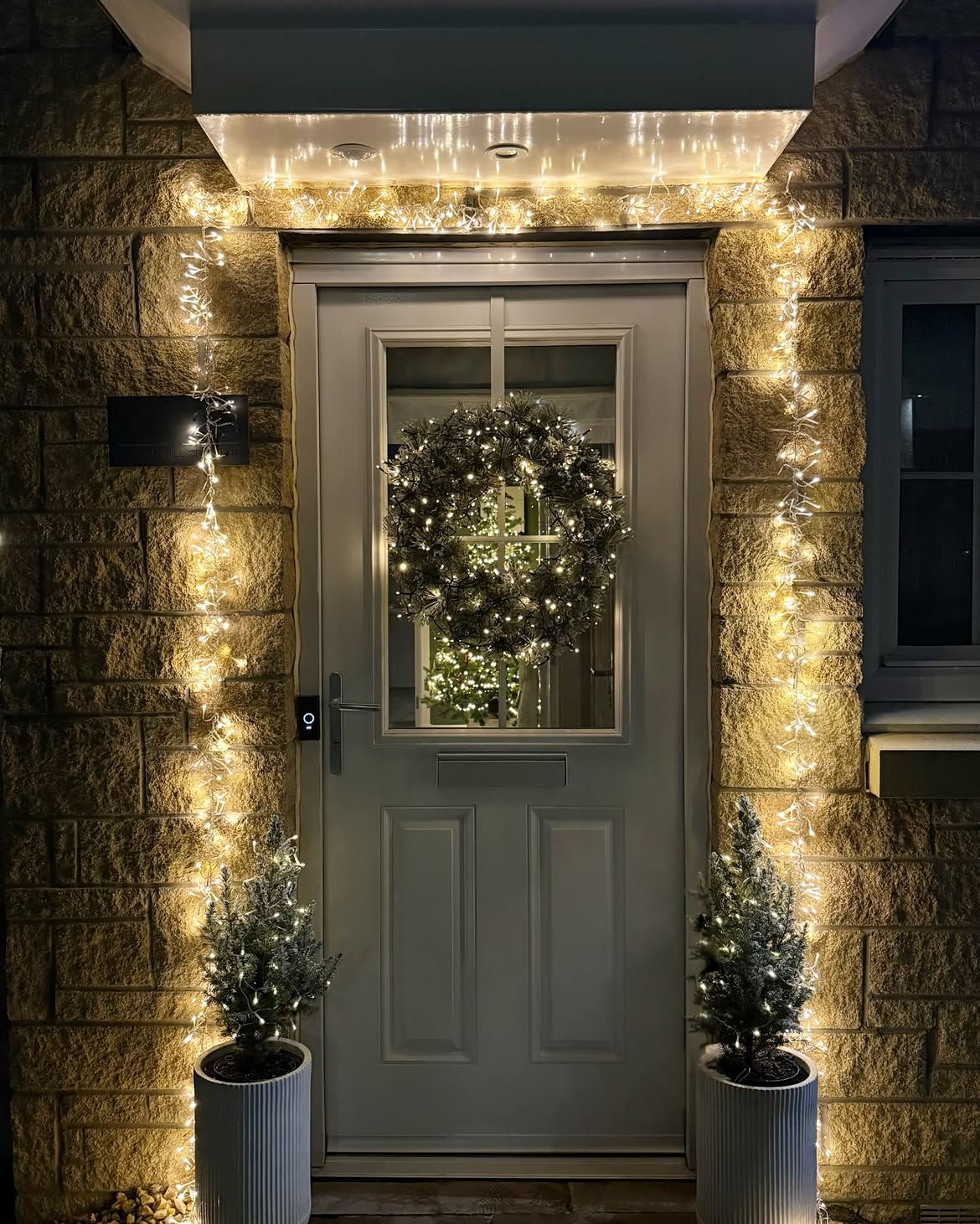 10-front-door-framed-in-cluster-lights