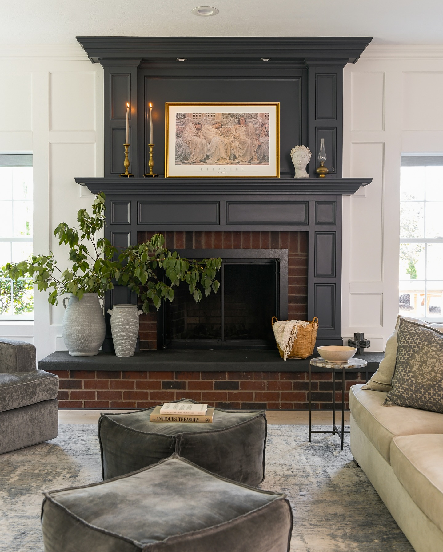 black-mantel-with-framed-art