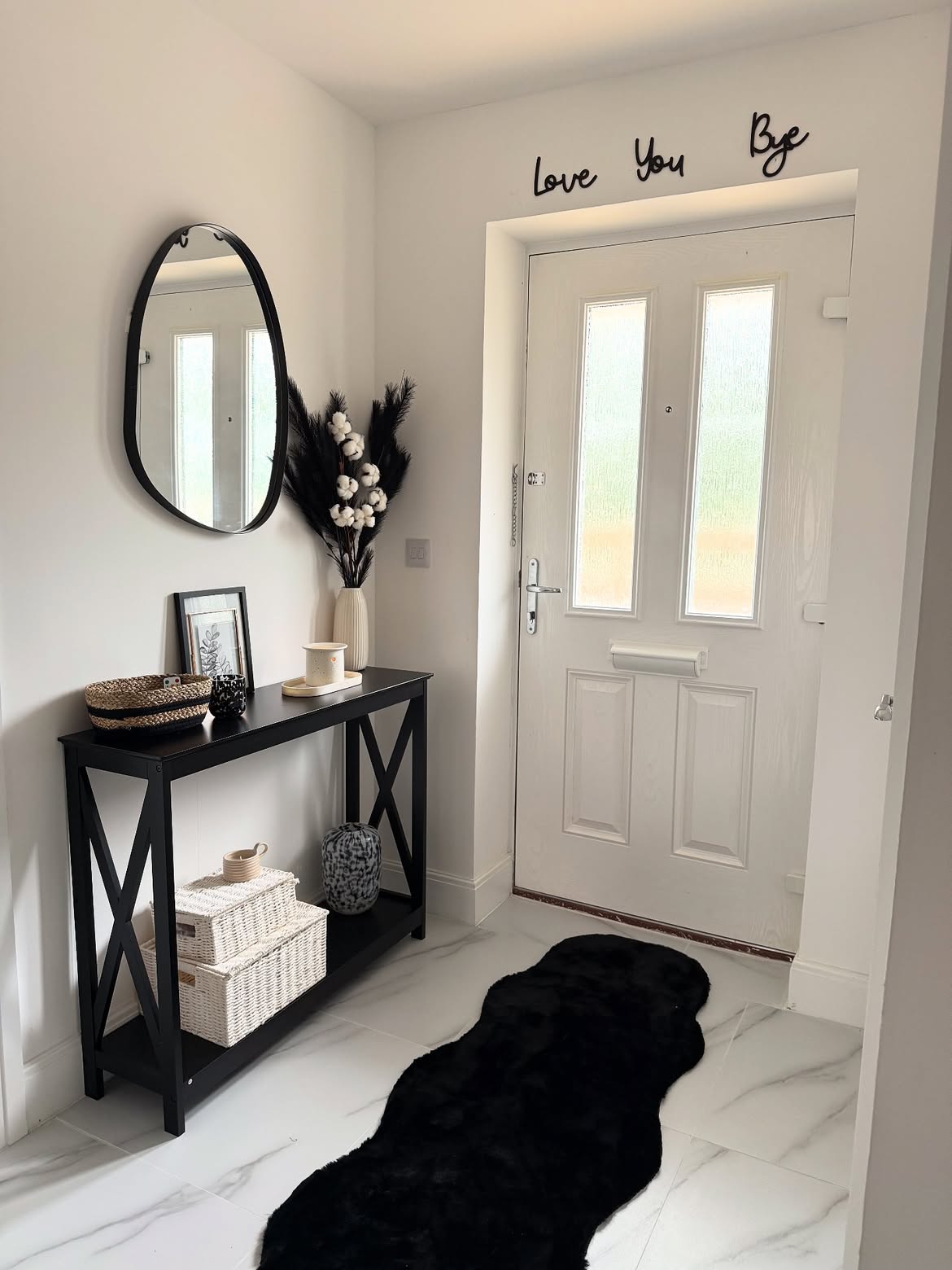 black-x-frame-console-table-hallway-entryway