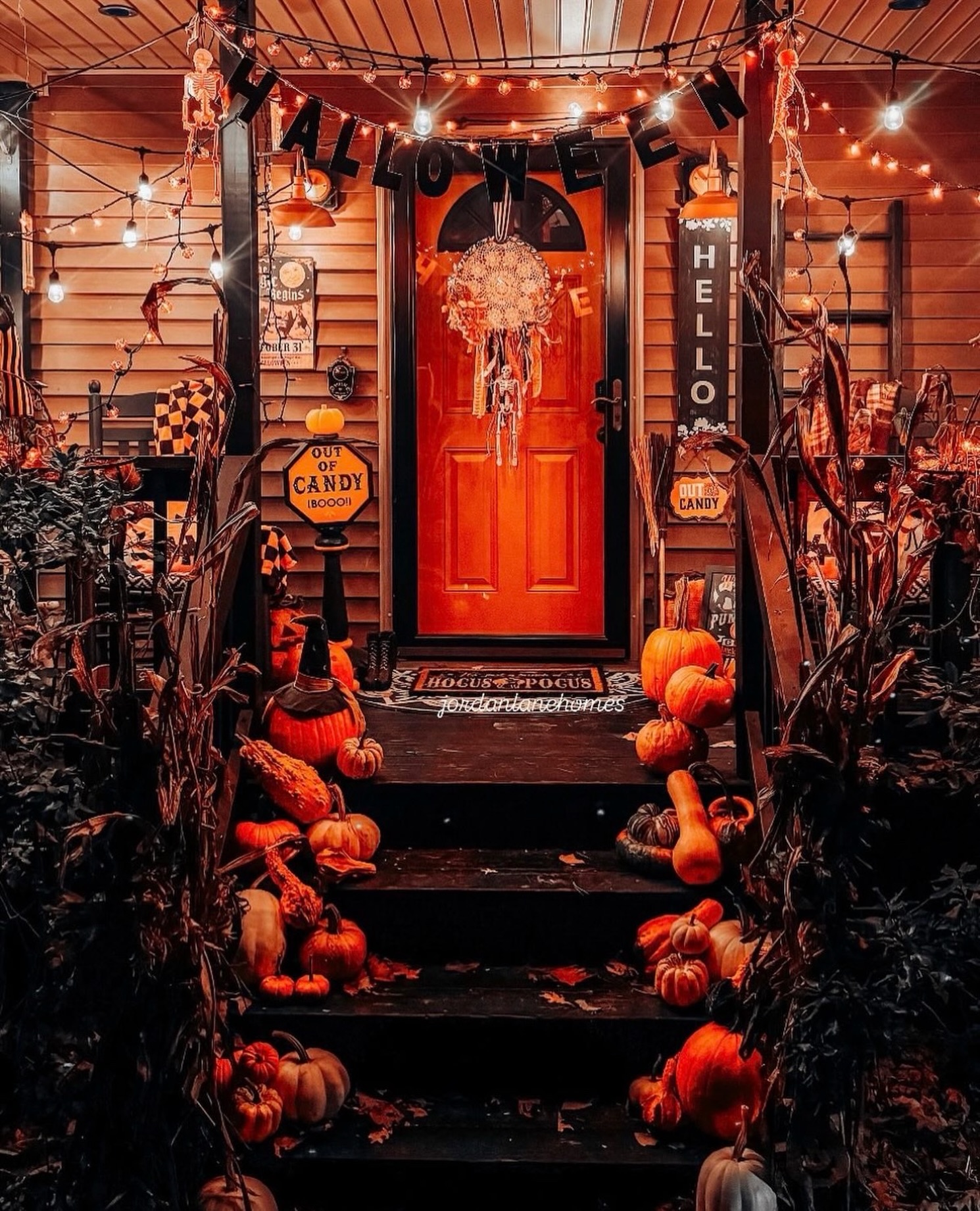 classic-orange-cottage-porch-with-string-lights-halloween