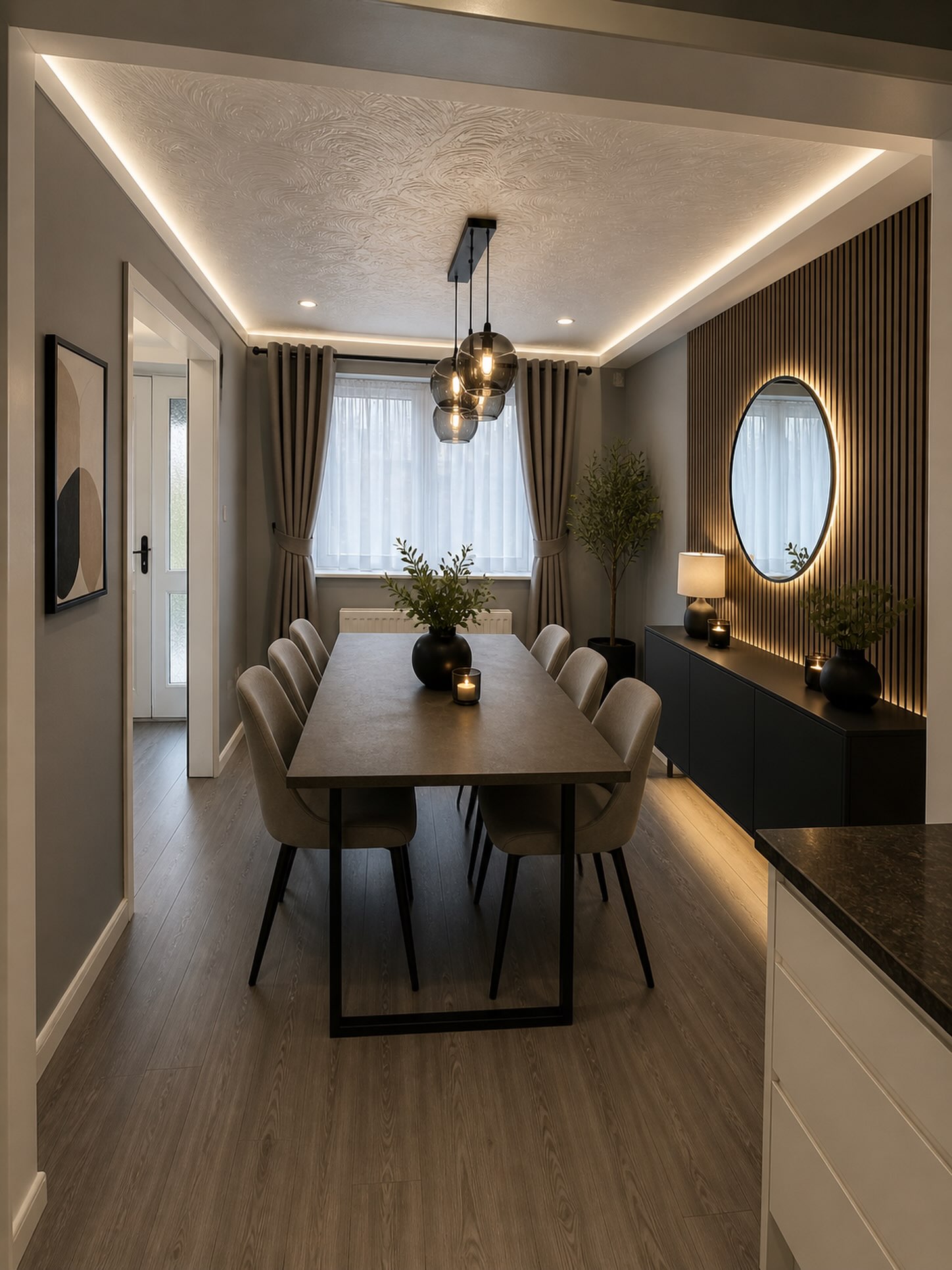 cove-lit-narrow-dining-room-with-slat-wall-_thehomediaries
