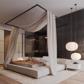 A modern bedroom with a low platform bed under a ceiling-mounted black frame canopy with draped beige fabric, dangling white glass pendant lamps, and black slatted wall paneling.