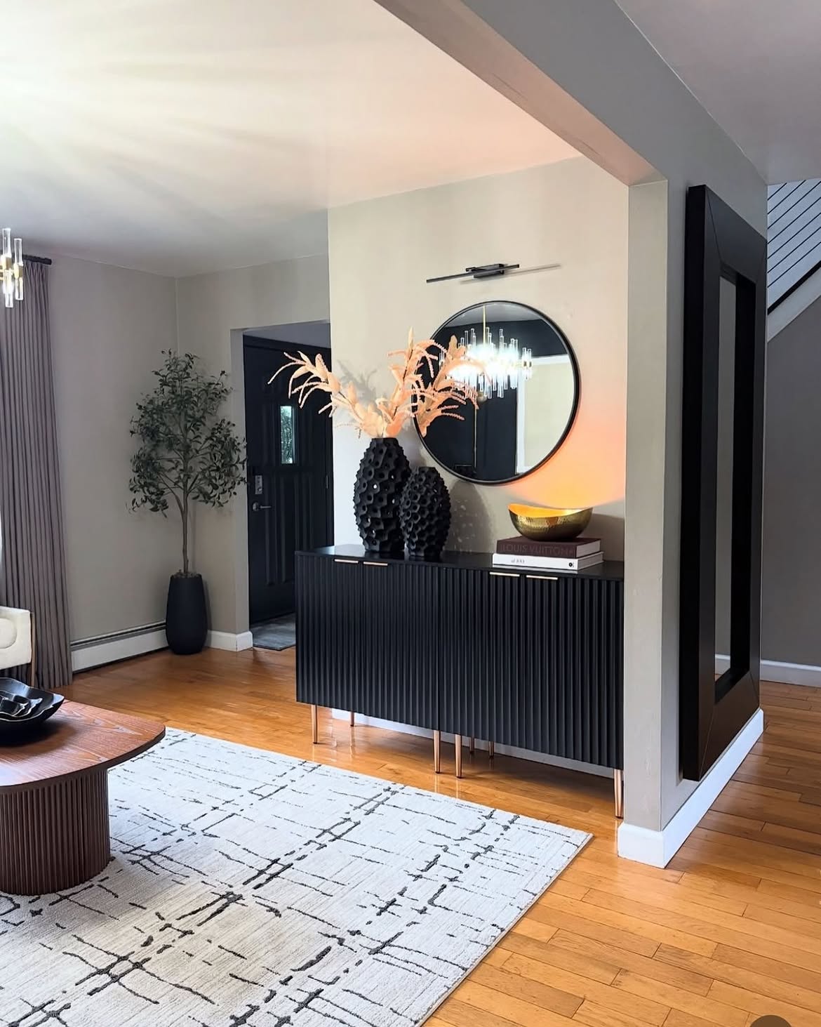 fluted-black-sideboard-gold-legs-hallway-console