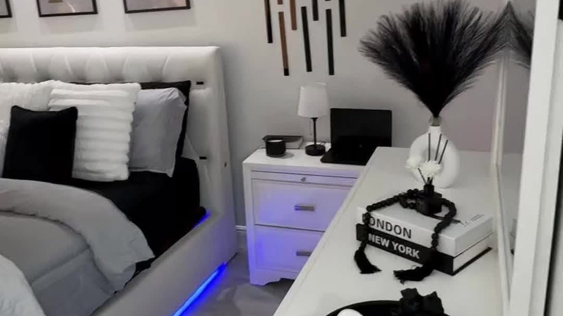 monochrome-black-white-bedroom-led-underlights-gallery-wall-clean-aesthetic