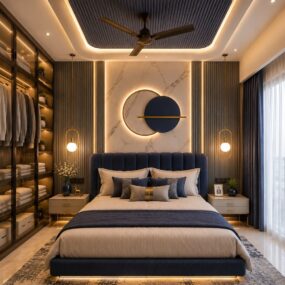 A navy tufted headboard bed against a marble and fluted feature wall, with gold globe pendants, tray ceiling, and lit glass wardrobe.
