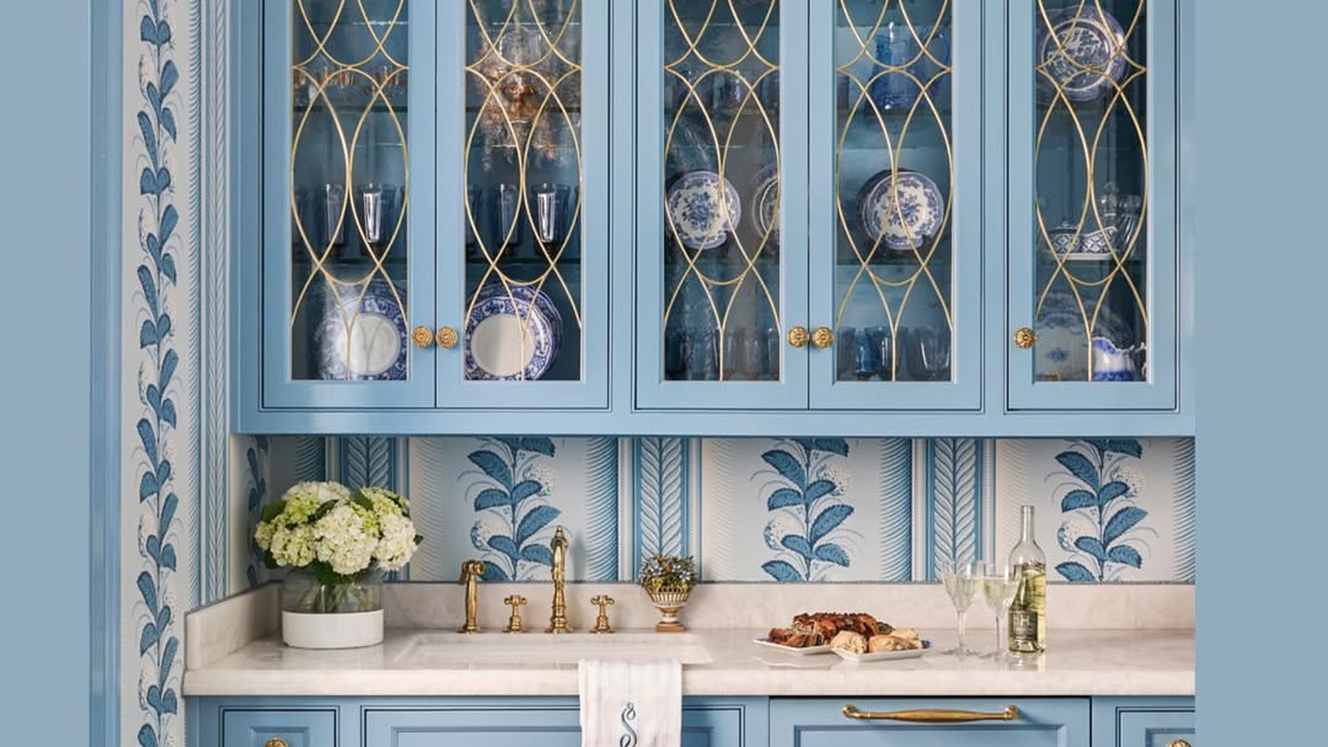powder-blue-butler-pantry-cabinets-leaded-glass-doors-gold-knobs
