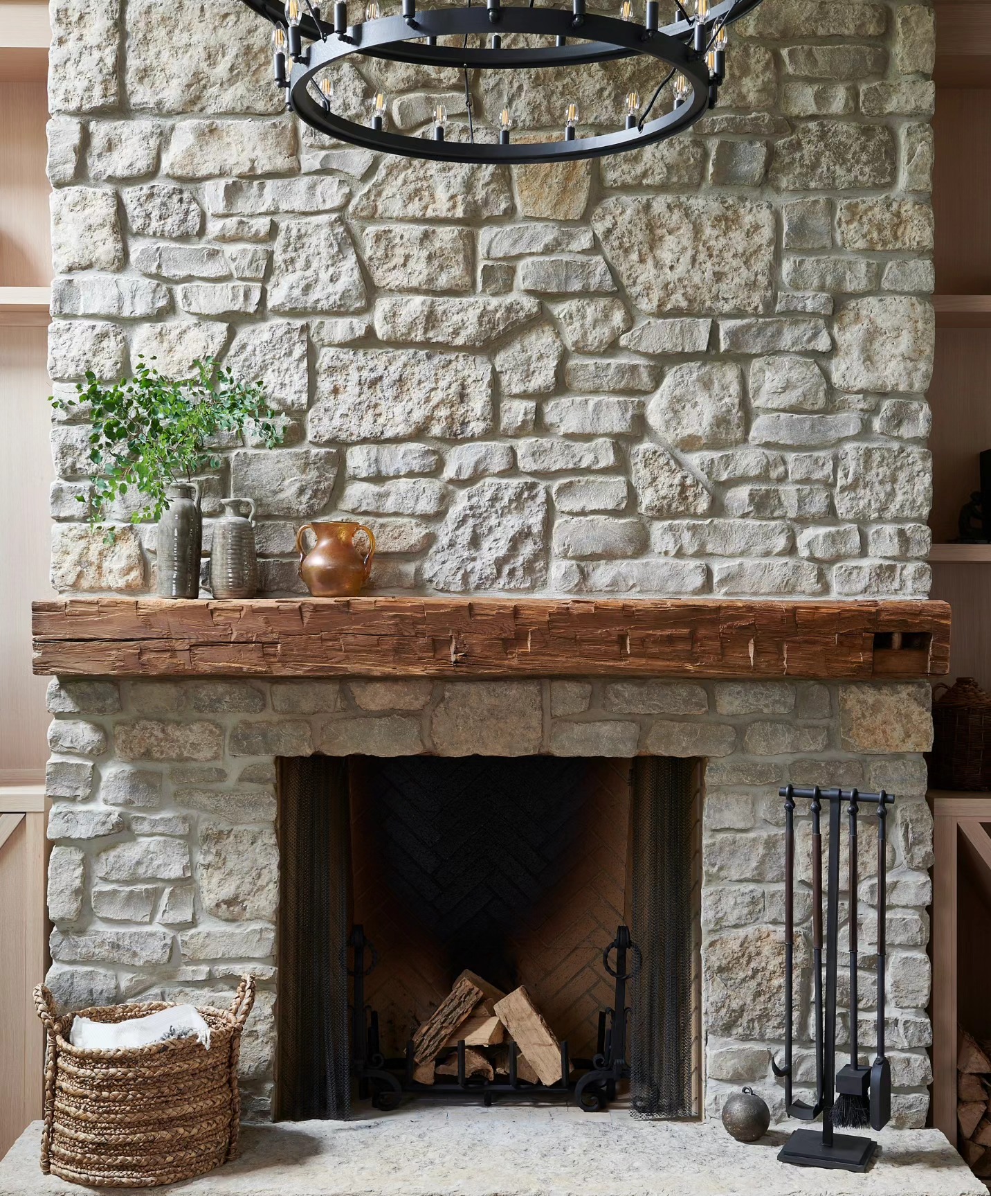 stone-fireplace-with-reclaimed-beam
