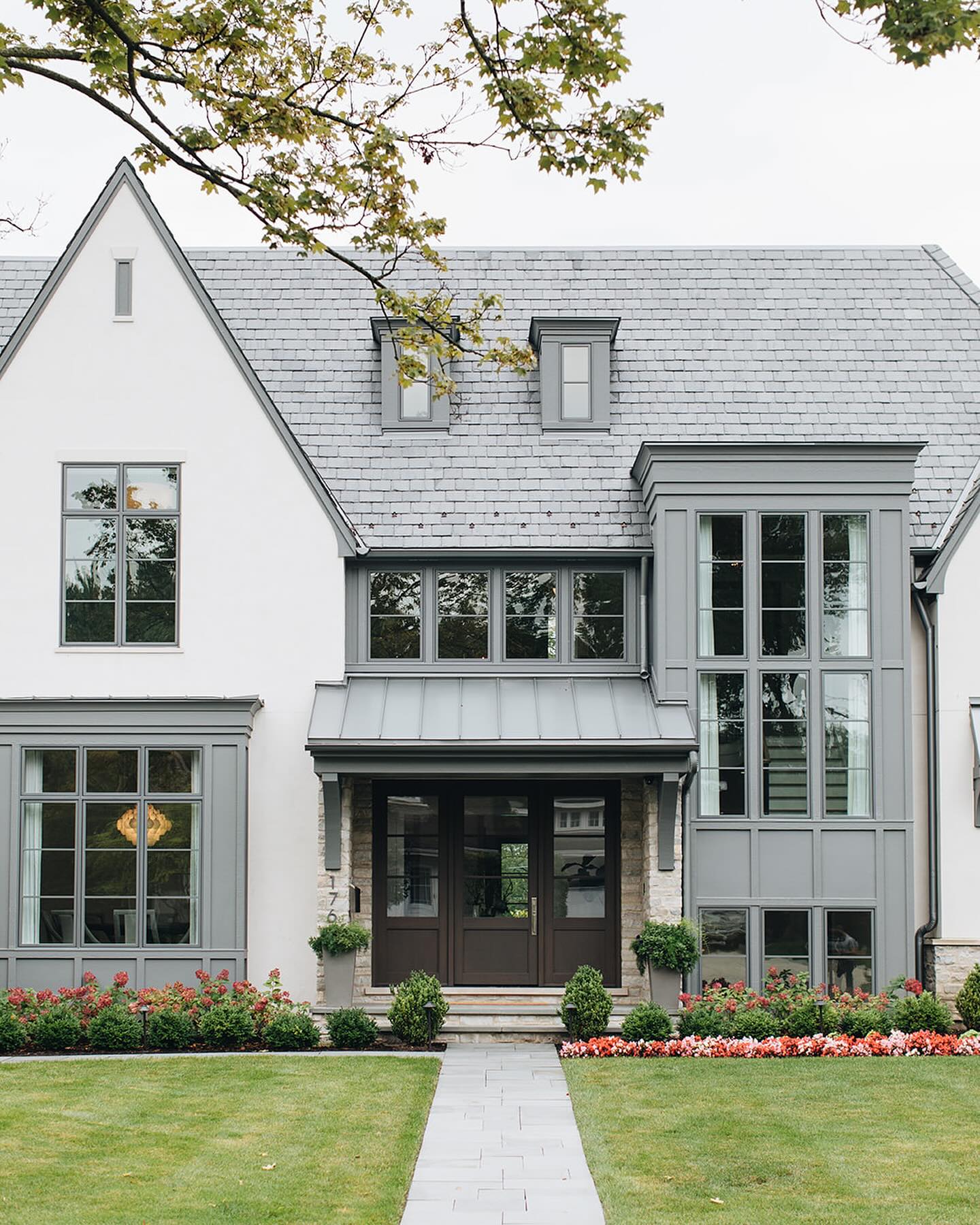 two-tone-white-slate-gray-modern-tudor-exterior-amystormandco