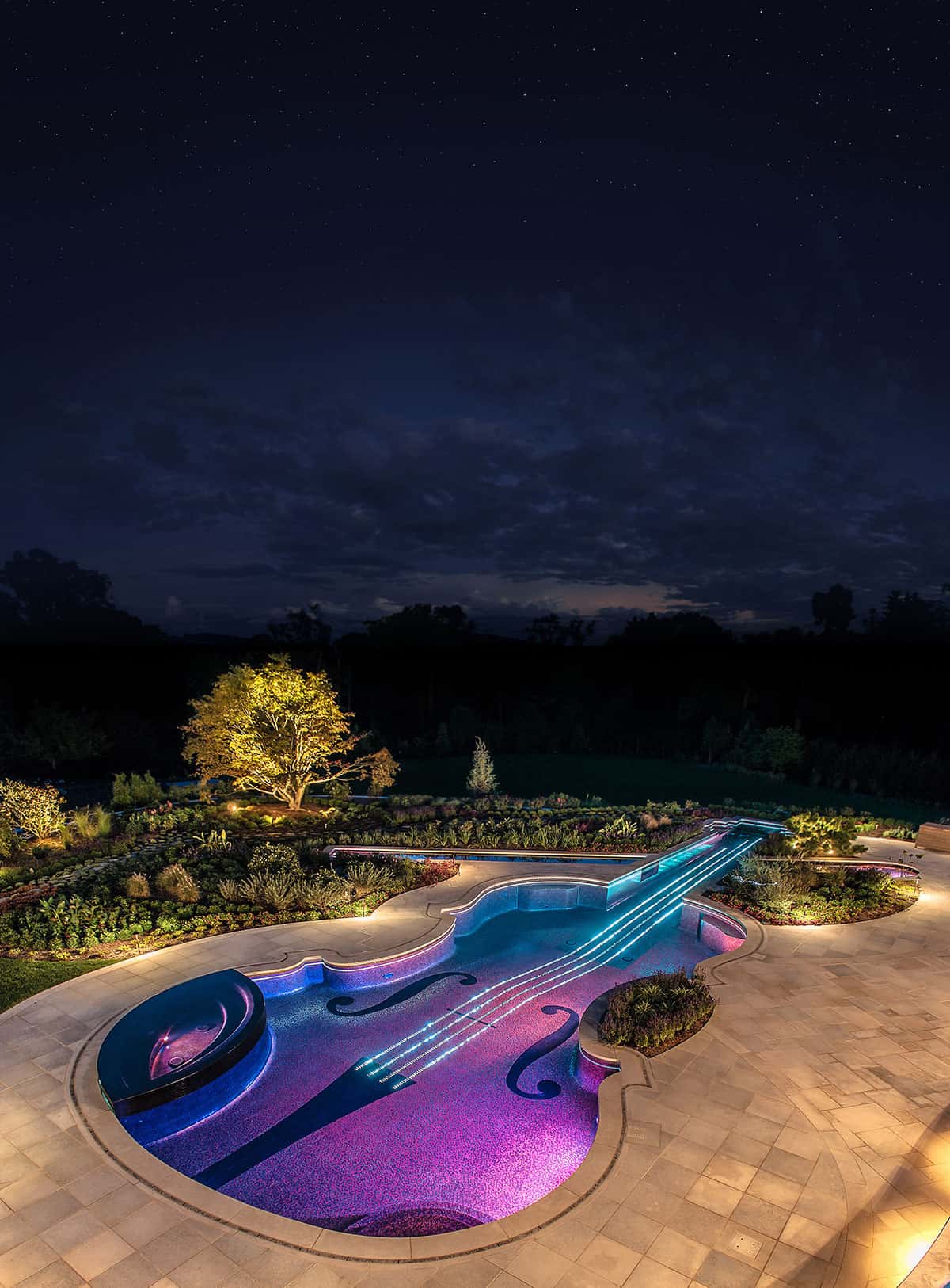 award-winning-stradivarius-violin-pool-cipriano-landscape-design-20-nighttime.jpg