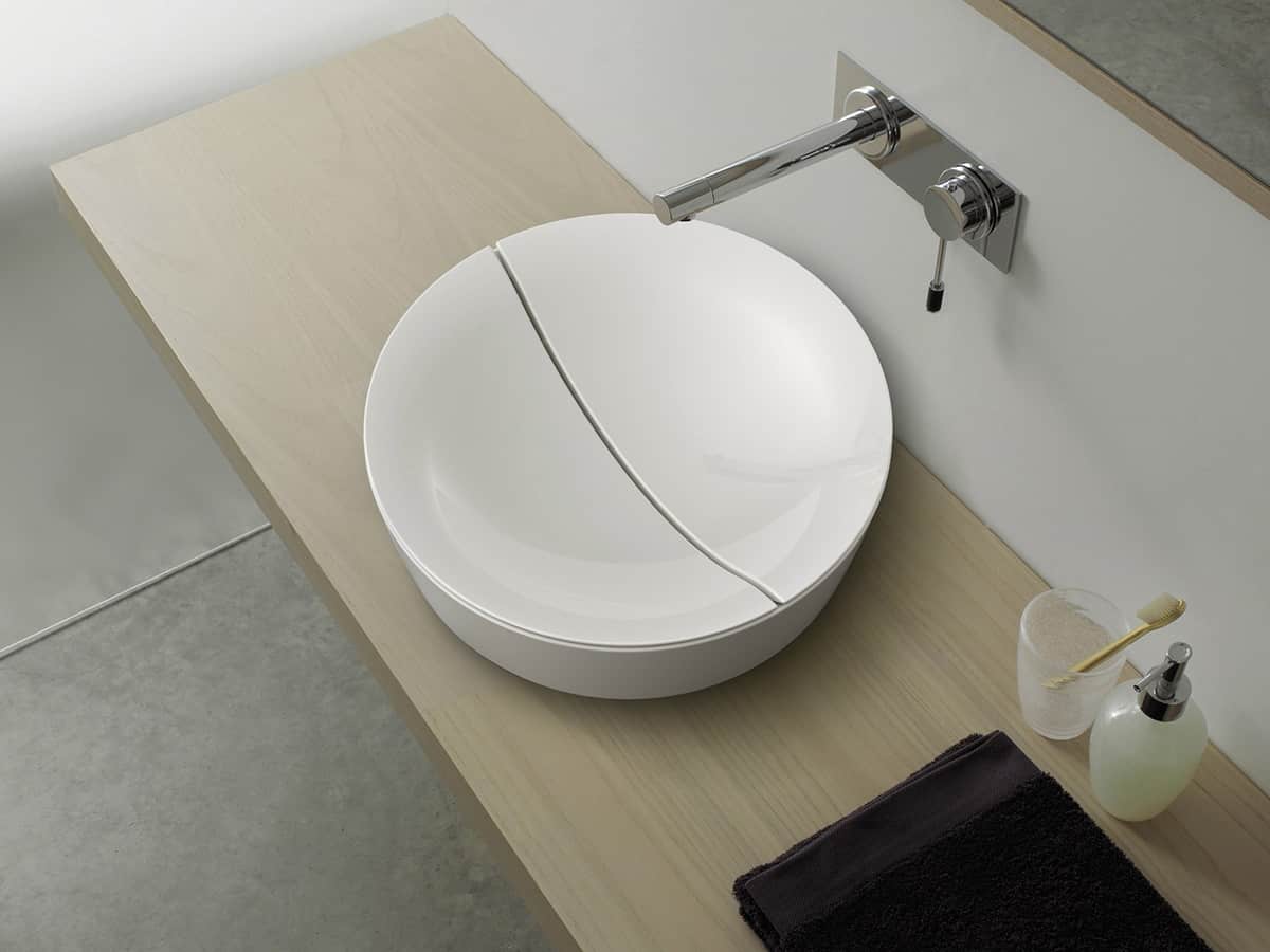 scarabeo-re-interprets-the-common-sink-drain-design-1.jpg