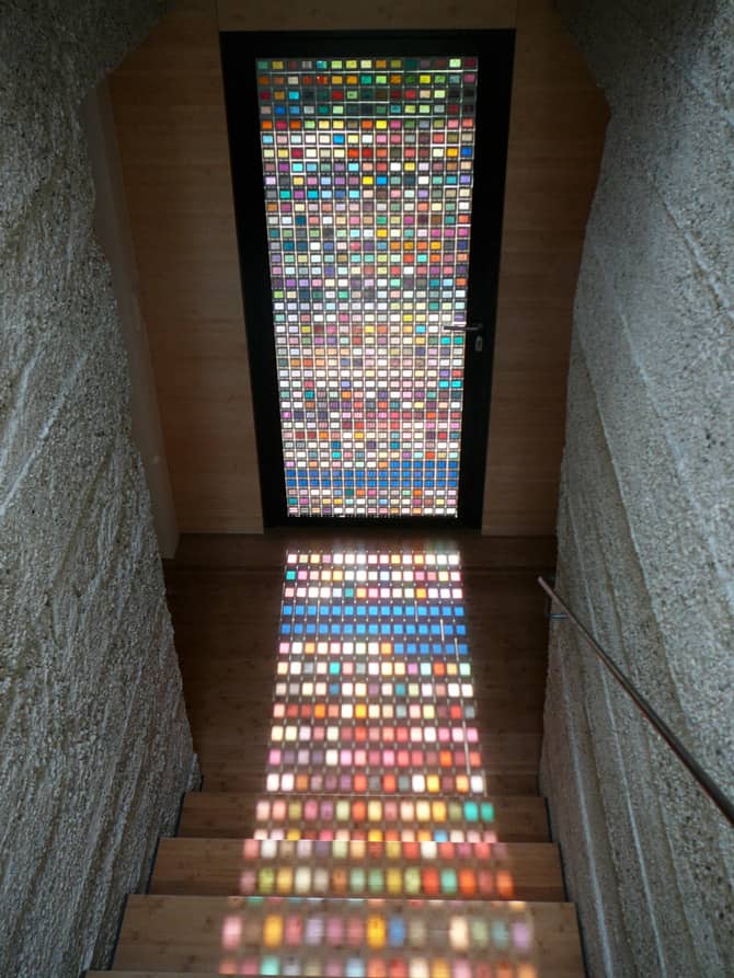 Laminated Glass Entry Door Creates a Mesmerizing Light Effect