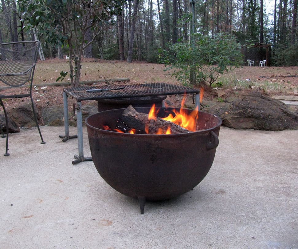 40 Metal Fire Pit Designs And Outdoor, Wok Style Cast Iron Fire Pit