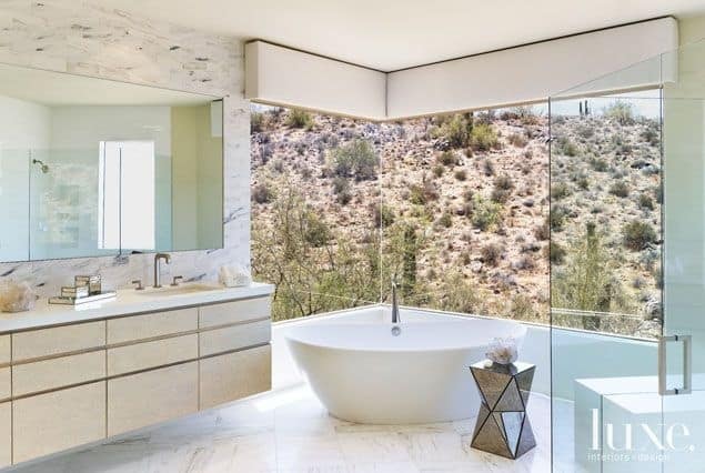 luxury bathroom overlooking desert tumbleweeds 26