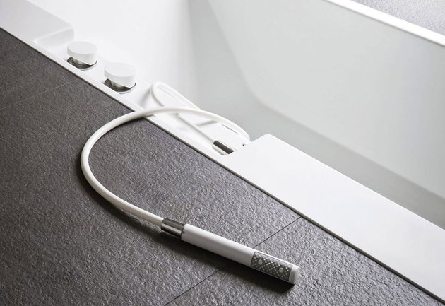 ergonomic-sunken-bathtub-installation-by-rexa-puts-bath-accessories-within-reach-3.jpg