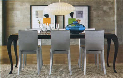 Phillipe Starck aluminum chairs with dining table