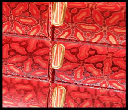 santwist-leather-blind-embossed-red-detail.jpg