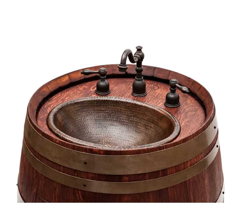 upcycled wine barrel vanities with hand hammered copper sinks 2