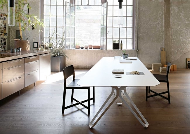 white tripod dining table by lema 3