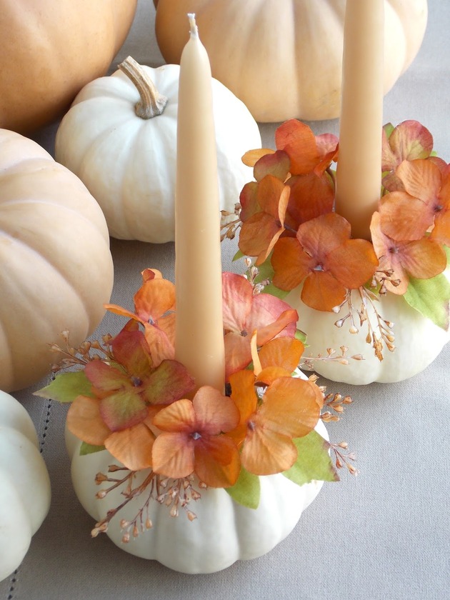 DIY pumpkin decorating ideas 2 candles thumb autox840 46315 12 Modern Ways to Decorate a Pumpkin without Carving