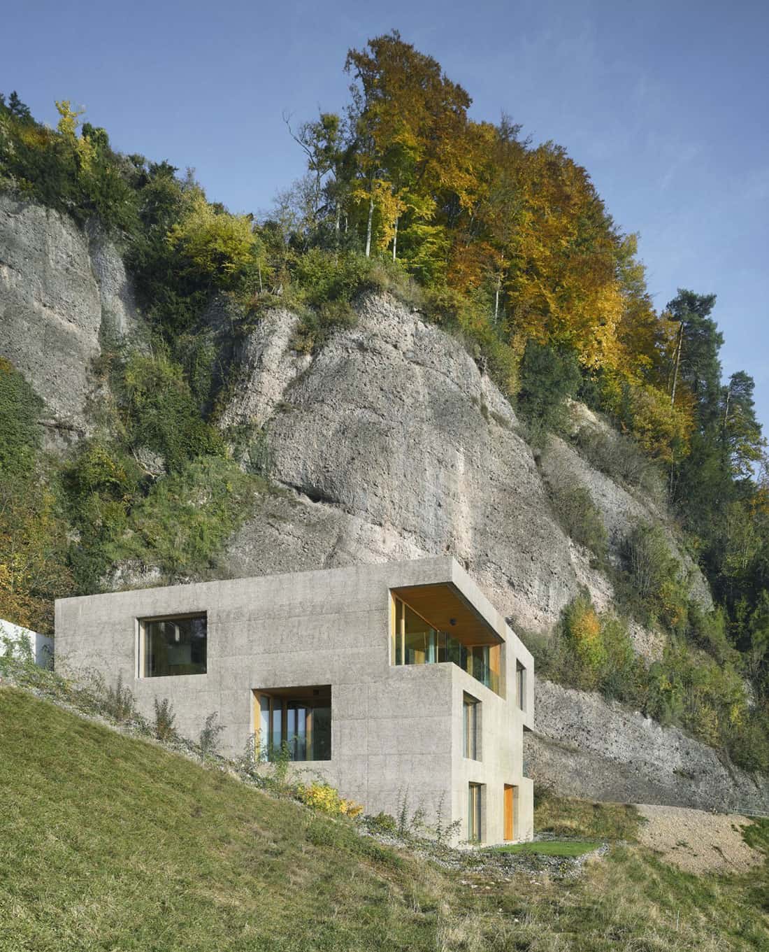 Hillside Home Is Wood Frame Construction With Concrete Facade