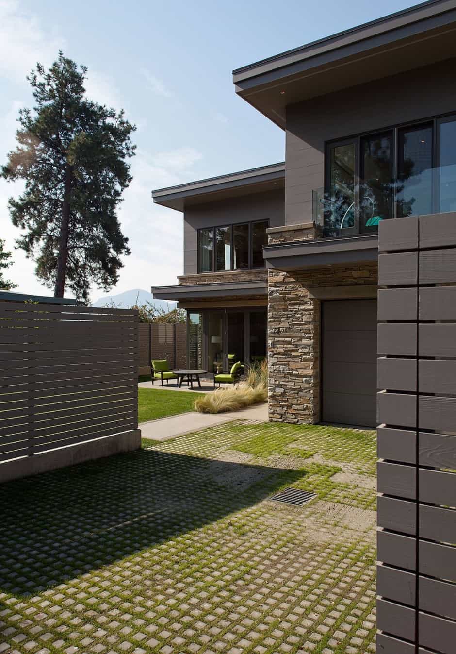 lakeside vacation home combines natural materials modern living 3 frontyard