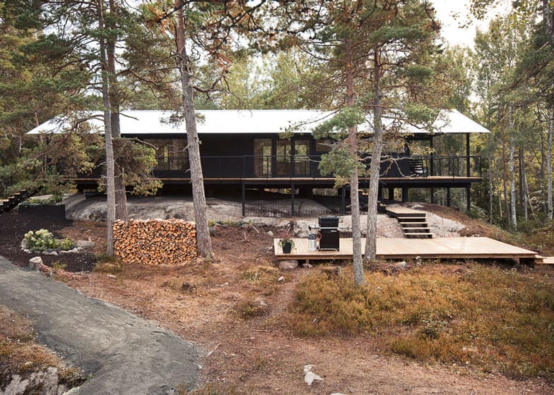 single storey summer house overlooks forested gorge sweden 3 garden deck