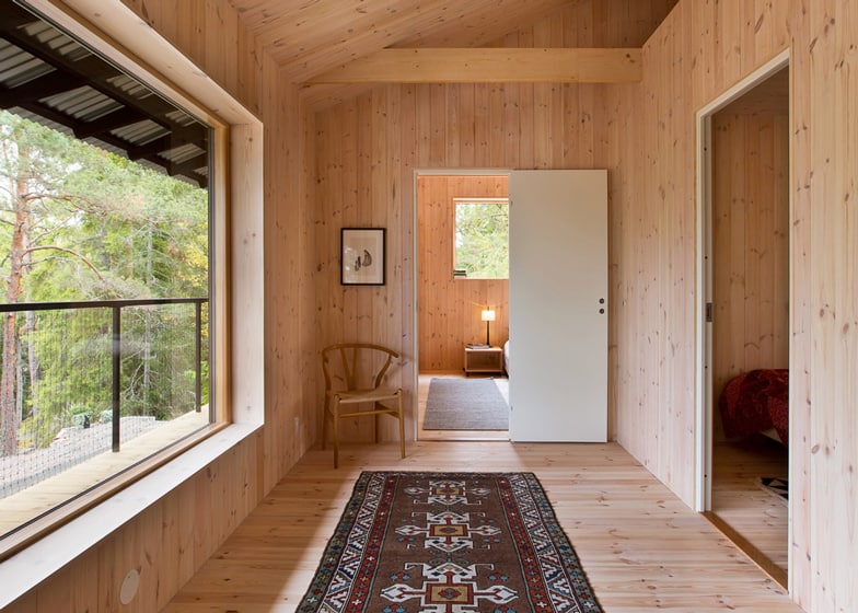 single storey summer house overlooks forested gorge sweden 7 hallway