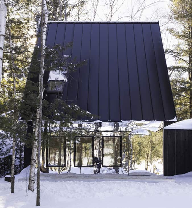 Mountain Cabin in Ontario Reflects Lakeside View with Mirrored Facade