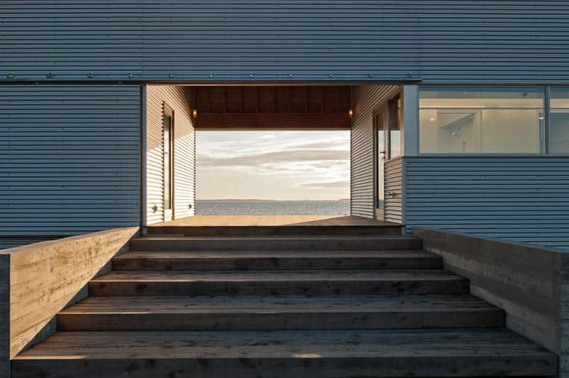 oceansi vacation house clad corrugated galvanized aluminium 4 entry stairs