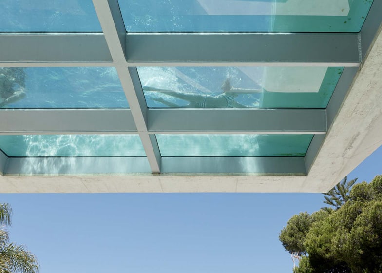 concrete-home-pool-glass-floor-4-pool-bench.jpg