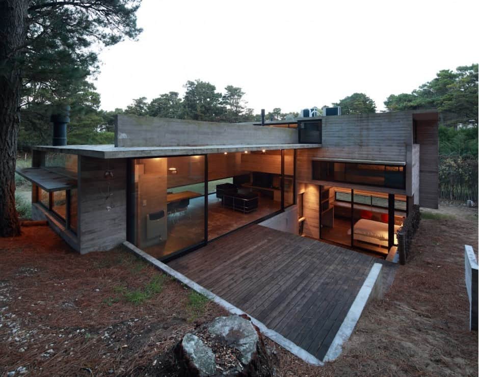 Concrete and Steel Summer Home Tucked into Pine Forest