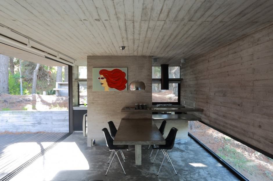 concrete steel home tucked pine forest 10 dining
