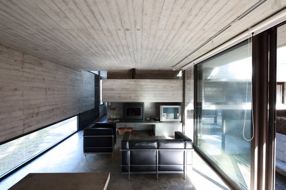 concrete-steel-home-tucked-pine-forest-4-living.jpg