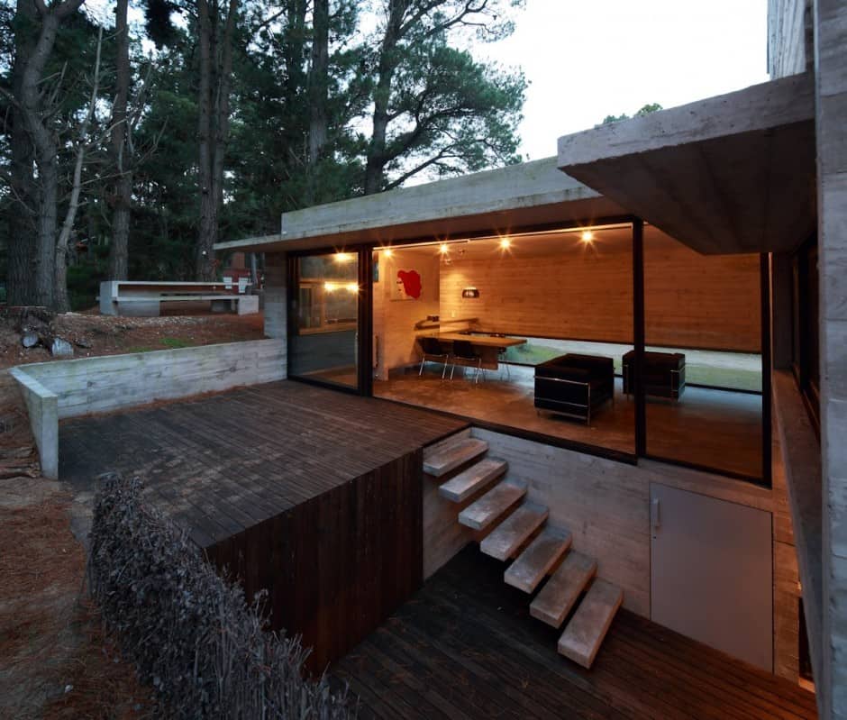 concrete steel home tucked pine forest 9 decks