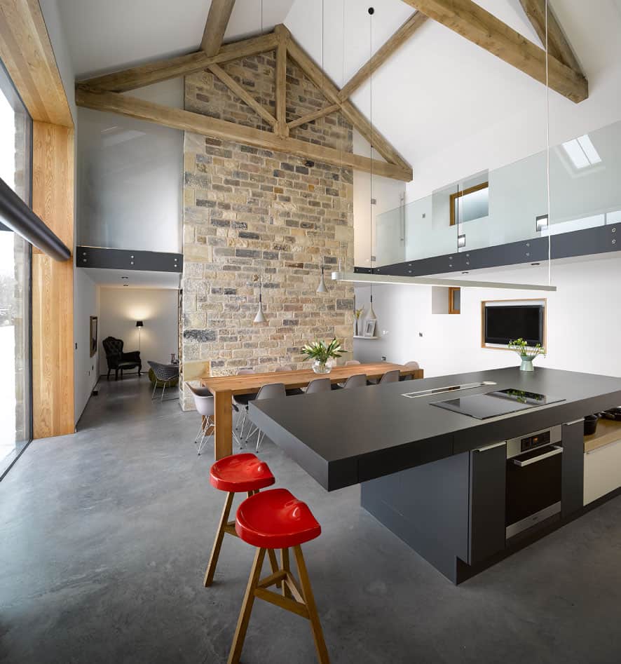historic barn reinvented modern home exposed trusses 3 dining